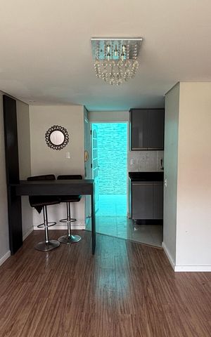 Casa de condomínio à venda com 100m², 2 quartos e 1 vaga Casa de condomínio à venda com 100m², 2 quartos e 1 vagaSala