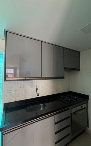 Casa de condomínio à venda com 100m², 2 quartos e 1 vaga Casa de condomínio à venda com 100m², 2 quartos e 1 vagaCozinha