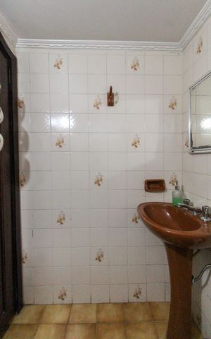 Casa à venda com 858m², 4 quartos e 4 vagasBanheiro de serviço