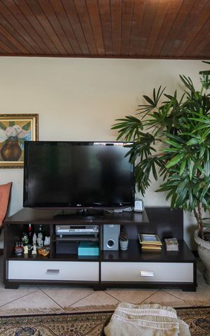 Casa à venda com 346m², 4 quartos e 3 vagasSala de TV