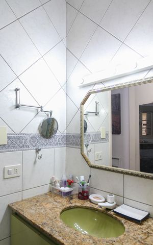 Casa à venda com 346m², 4 quartos e 3 vagasBanheiro Suíte 2