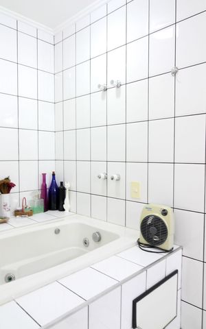 Casa à venda com 346m², 4 quartos e 3 vagasBanheiro Suíte 1