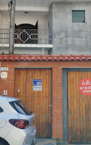 Casa à venda com 380m², 3 quartos e 7 vagas Casa à venda com 380m², 3 quartos e 7 vagasFachada e Placa