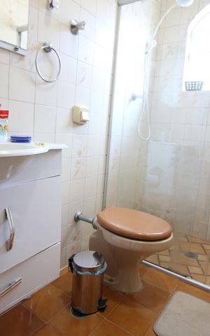 Casa à venda com 180m², 3 quartos e 2 vagasBanheiro da Suíte 1