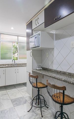 Apartamento à venda com 102m², 3 quartos e sem vagaCozinha e Área de Serviço