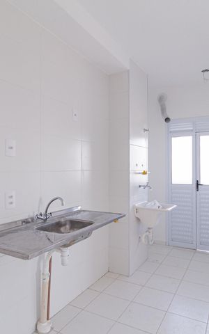 Apartamento para alugar com 46m², 2 quartos e 1 vaga Apartamento para alugar com 46m², 2 quartos e 1 vagaCozinha e área de serviço