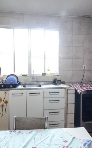Casa à venda com 150m², 3 quartos e 2 vagas Casa à venda com 150m², 3 quartos e 2 vagasCozinha