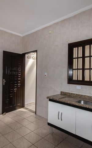 Casa à venda com 141m², 3 quartos e 2 vagas Casa à venda com 141m², 3 quartos e 2 vagasCozinha