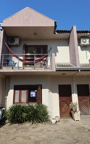 Casa de condomínio à venda com 82m², 2 quartos e 1 vagaFachada e placa