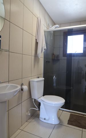 Casa de condomínio à venda com 82m², 2 quartos e 1 vagaBanheiro da Suíte