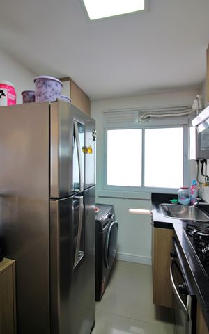 Apartamento à venda com 54m², 2 quartos e 1 vagaCozinha e Área de Serviço