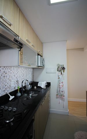 Apartamento à venda com 54m², 2 quartos e 1 vagaCozinha e Área de Serviço