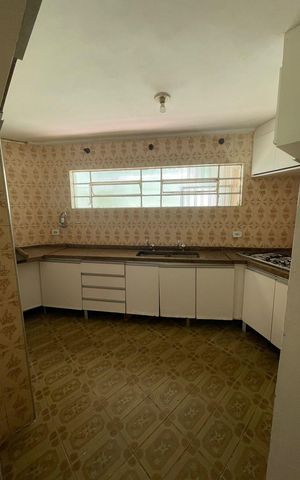 Casa à venda com 254m², 4 quartos e 2 vagas Casa à venda com 254m², 4 quartos e 2 vagasCozinha