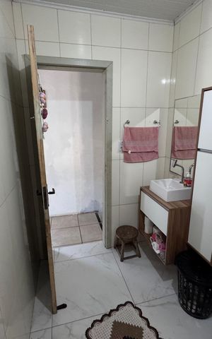 Casa à venda com 128m², 2 quartos e 2 vagasBanheiro