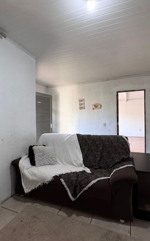 Casa à venda com 128m², 2 quartos e 2 vagasSala