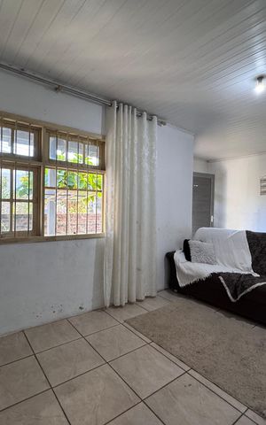 Casa à venda com 128m², 2 quartos e 2 vagasSala