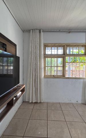 Casa à venda com 128m², 2 quartos e 2 vagasSala