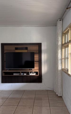 Casa à venda com 128m², 2 quartos e 2 vagasSala