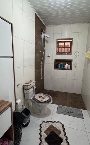 Casa à venda com 128m², 2 quartos e 2 vagasBanheiro