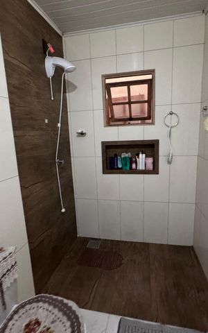 Casa à venda com 128m², 2 quartos e 2 vagasBanheiro