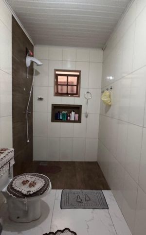 Casa à venda com 128m², 2 quartos e 2 vagasBanheiro