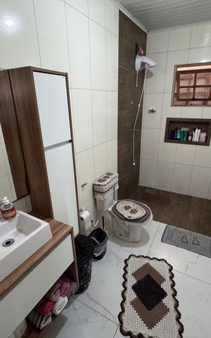 Casa à venda com 128m², 2 quartos e 2 vagasBanheiro