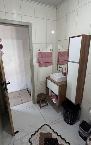 Casa à venda com 128m², 2 quartos e 2 vagasBanheiro
