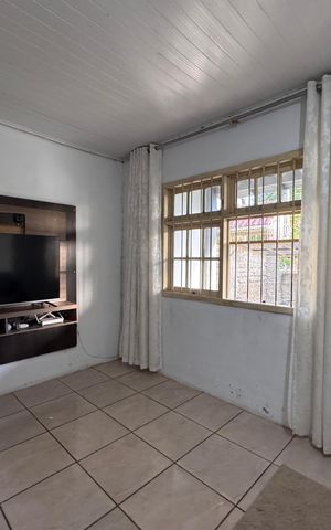 Casa à venda com 128m², 2 quartos e 2 vagasSala