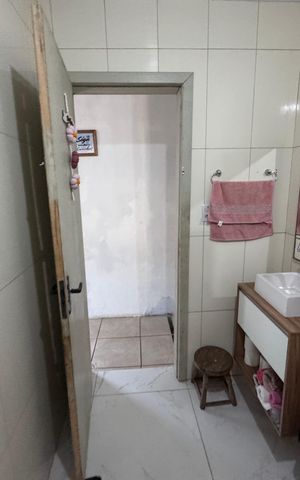 Casa à venda com 128m², 2 quartos e 2 vagasBanheiro