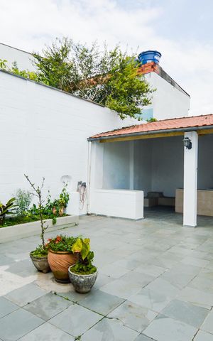 Casa à venda com 342m², 4 quartos e 2 vagasQuintal