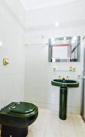 Casa à venda com 342m², 4 quartos e 2 vagasBanheiro Suíte 2