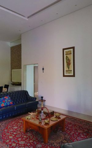 Casa de condomínio para alugar com 400m², 5 quartos e 4 vagasSala