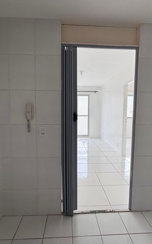 Apartamento à venda com 50m², 3 quartos e 1 vaga Apartamento à venda com 50m², 3 quartos e 1 vagaCozinha e Área de Serviço