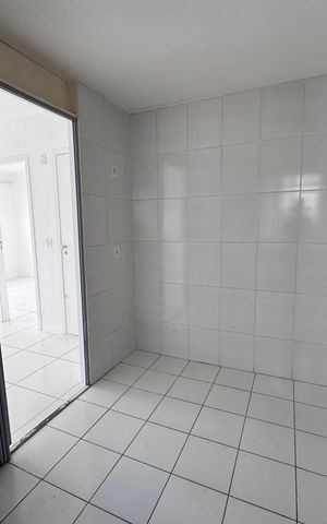 Apartamento à venda com 50m², 3 quartos e 1 vaga Apartamento à venda com 50m², 3 quartos e 1 vagaCozinha e Área de Serviço