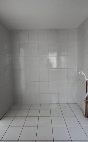 Apartamento à venda com 50m², 3 quartos e 1 vaga Apartamento à venda com 50m², 3 quartos e 1 vagaCozinha e Área de Serviço