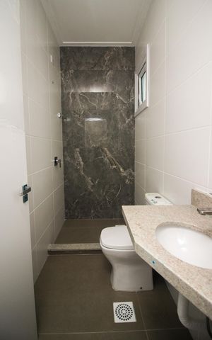 Casa de condomínio à venda com 96m², 3 quartos e 2 vagas Casa de condomínio à venda com 96m², 3 quartos e 2 vagasBanheiro Social