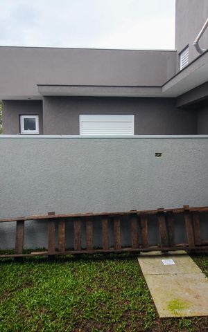 Casa de condomínio à venda com 96m², 3 quartos e 2 vagas Casa de condomínio à venda com 96m², 3 quartos e 2 vagasVista da Suíte