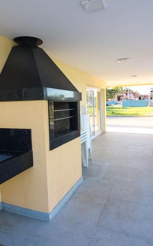 Casa de condomínio à venda com 96m², 3 quartos e 2 vagas Casa de condomínio à venda com 96m², 3 quartos e 2 vagasÁrea comum - Churrasqueira