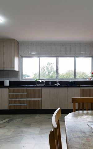 Casa à venda com 200m², 4 quartos e 3 vagas Casa à venda com 200m², 4 quartos e 3 vagasCozinha