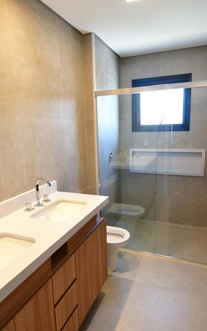 Casa de condomínio à venda com 230m², 3 quartos e 4 vagasBanheiro Suíte