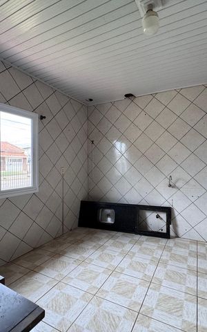 Casa à venda com 110m², 3 quartos e 2 vagas Casa à venda com 110m², 3 quartos e 2 vagasCozinha