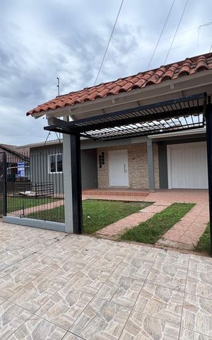 Casa à venda com 110m², 3 quartos e 2 vagas Casa à venda com 110m², 3 quartos e 2 vagasFachada