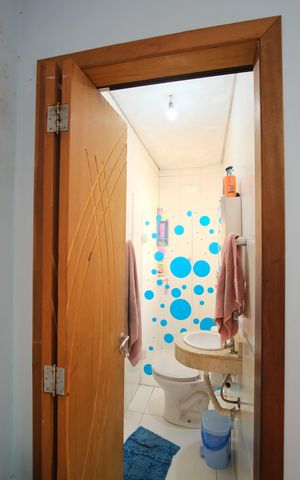 Casa à venda com 145m², 2 quartos e 2 vagasBanheiro da Suíte 1