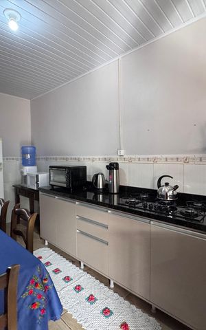 Casa à venda com 75m², 3 quartos e 3 vagas Casa à venda com 75m², 3 quartos e 3 vagasCozinha