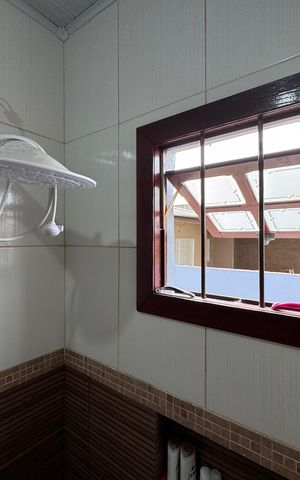 Casa à venda com 75m², 3 quartos e 3 vagas Casa à venda com 75m², 3 quartos e 3 vagasBanheiro