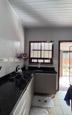 Casa à venda com 75m², 3 quartos e 3 vagas Casa à venda com 75m², 3 quartos e 3 vagasCozinha