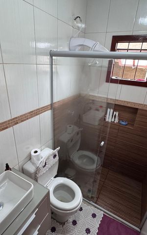 Casa à venda com 75m², 3 quartos e 3 vagas Casa à venda com 75m², 3 quartos e 3 vagasBanheiro