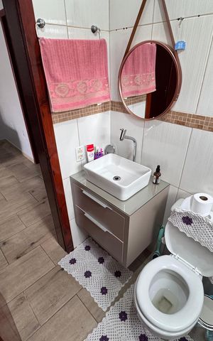 Casa à venda com 75m², 3 quartos e 3 vagas Casa à venda com 75m², 3 quartos e 3 vagasBanheiro