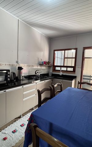 Casa à venda com 75m², 3 quartos e 3 vagas Casa à venda com 75m², 3 quartos e 3 vagasCozinha