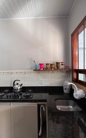 Casa à venda com 75m², 3 quartos e 3 vagas Casa à venda com 75m², 3 quartos e 3 vagasCozinha